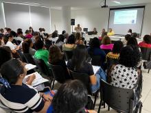 foto da reunião no auditório do Compaz Ariano Suassuna